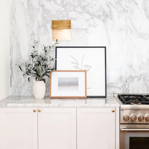 Stock image of picture farmes displayed on a marble counter